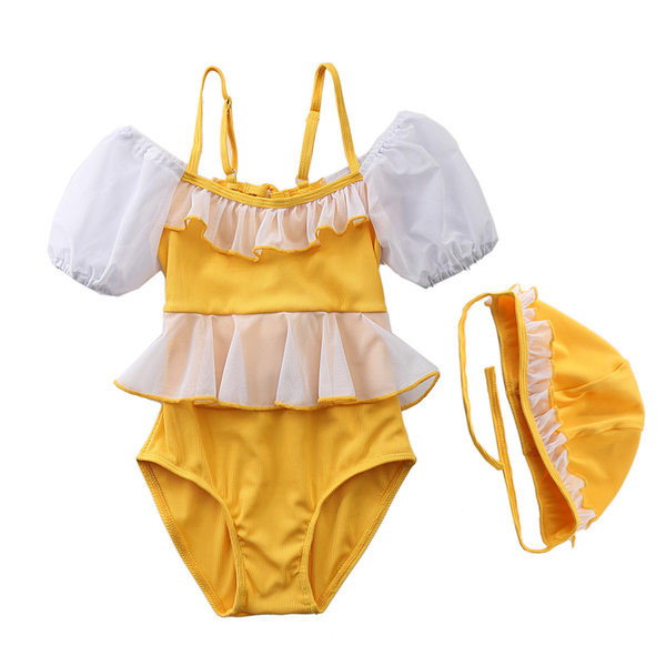 Peenikeste rihmade ja lokkidega laste ujumistrikoo tüdrukutele