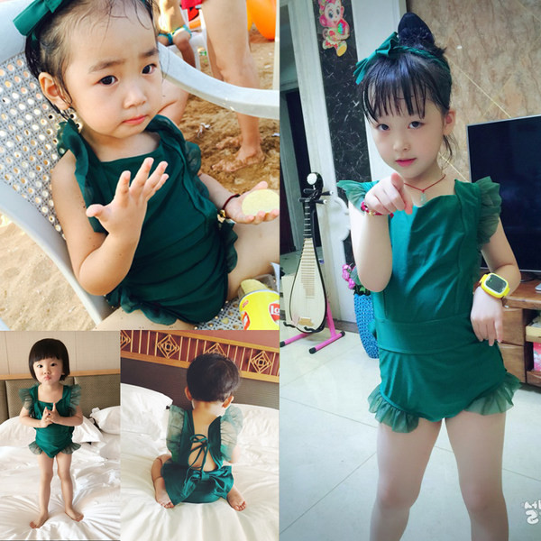 Täielik roheline ujumistrikoo, seljal pael