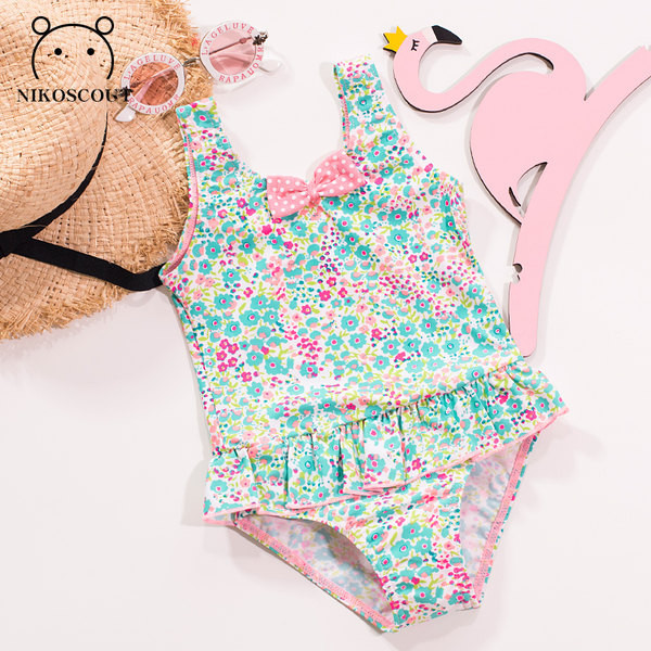 Lillemotiivide ja paelaga terve laste ujumistrikoo