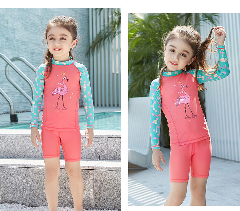 Uus mudel pikkade varrukatega ja flamingo aplikatsiooniga laste ujumistrikoo