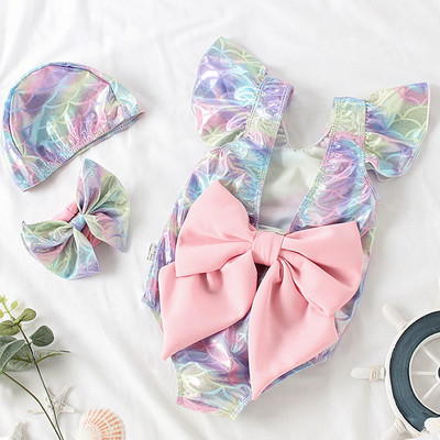 Täielik ujumistrikoo tüdrukutele, mille seljas on roosa pael