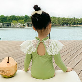 Pikkade varrukate ja pitsiga laste täisujumistrikoo