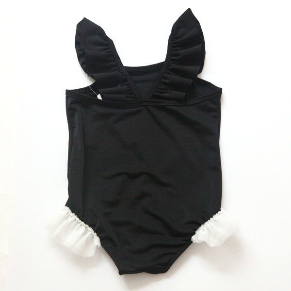 Dječji kupaći kostim crne boje s aplikacijom