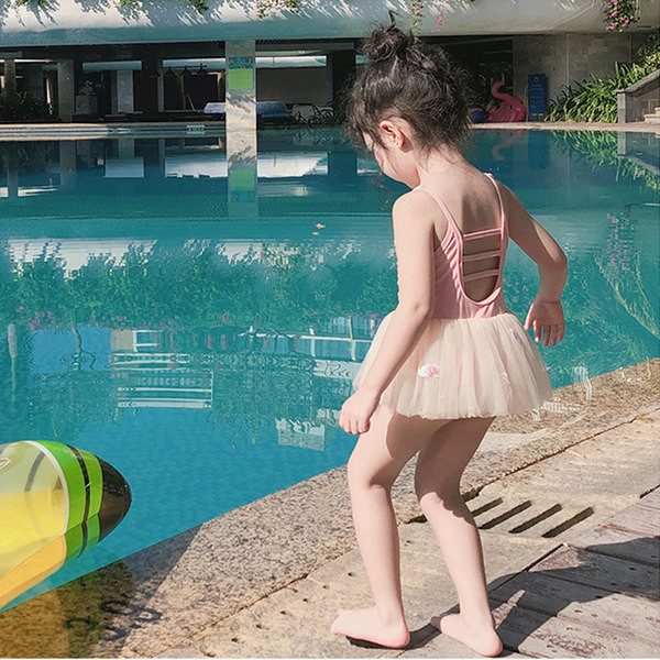 Peenikeste rihmade ja tülliga laste ujumistrikoo