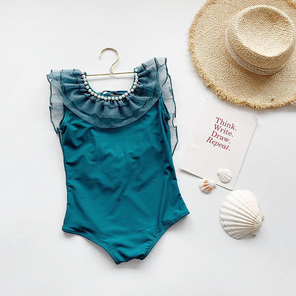 Dječji kupaći kostim od tila i bisera