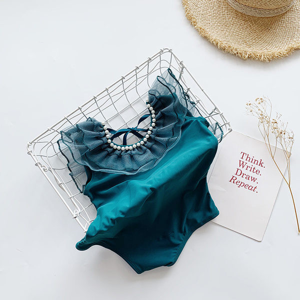 Dječji kupaći kostim od tila i bisera