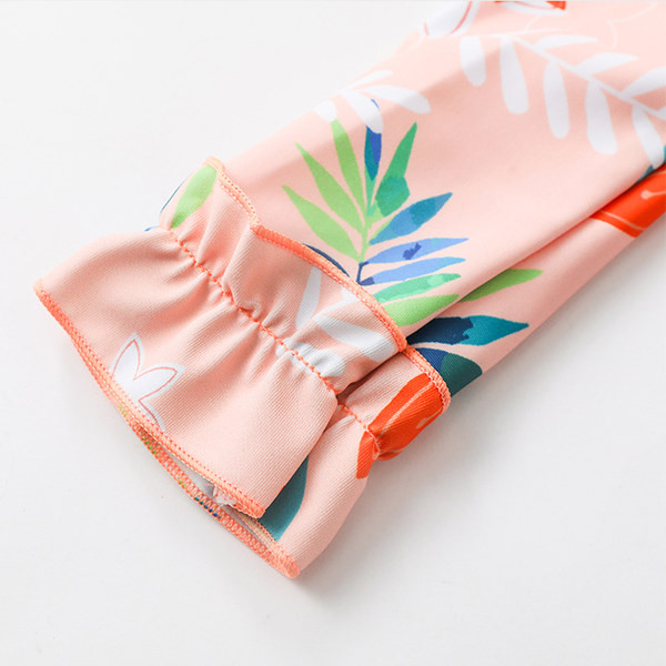 Päikesekaitsega laste lillemustriga ujumistrikoo