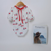 Kirsiga kaunistusega ja lühikeste varrukatega täielik laste ujumistrikoo