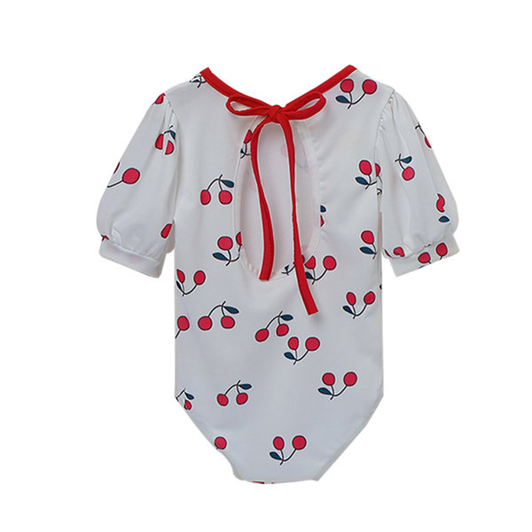 Kirsiga kaunistusega ja lühikeste varrukatega täielik laste ujumistrikoo