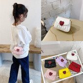 Dječja elegantna torba s dugom metalnom ručkom