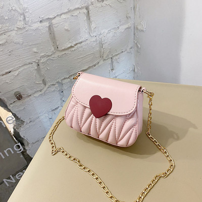 Dječja elegantna torba s dugom metalnom ručkom