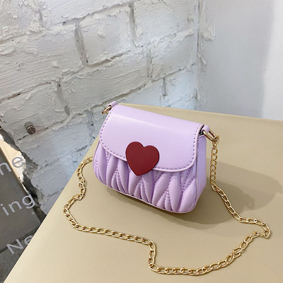 Dječja elegantna torba s dugom metalnom ručkom