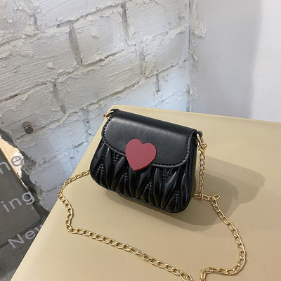 Dječja elegantna torba s dugom metalnom ručkom