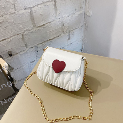 Dječja elegantna torba s dugom metalnom ručkom