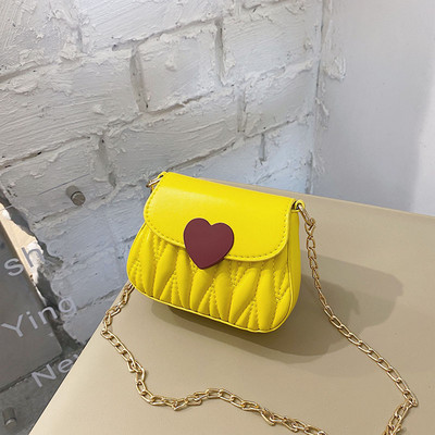 Dječja elegantna torba s dugom metalnom ručkom