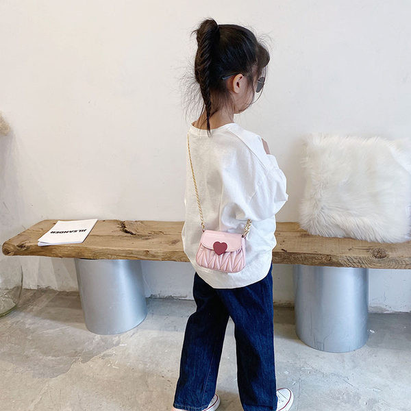 Dječja elegantna torba s dugom metalnom ručkom