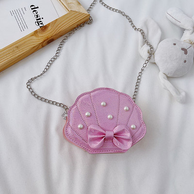 Stiilne dekoratiivpärlite ja metallist käepidemega lastekott