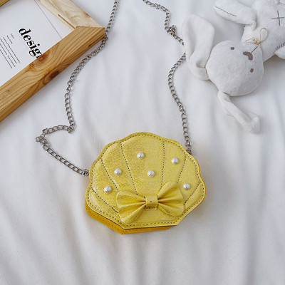 Stiilne dekoratiivpärlite ja metallist käepidemega lastekott