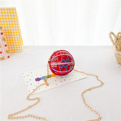 Moderna dječja okrugla mini torba s dugom metalnom ručkom