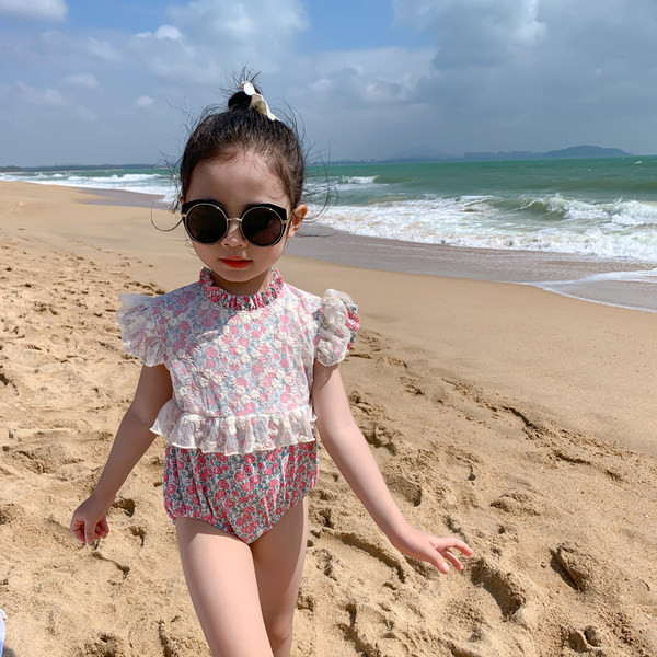 Värviline laste lilleline ujumistrikoo