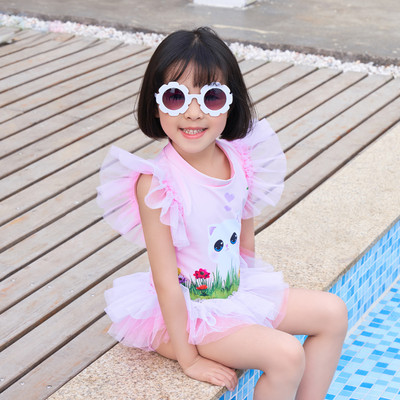 Moodne tülli ja värvilise aplikatsiooniga ujumistrikoo tüdrukutele