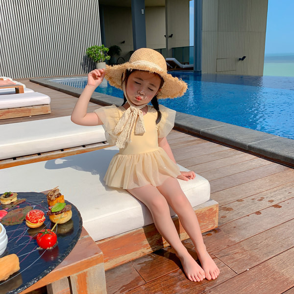 Dječji kupaći kostim s kratkim rukavima i vezicama