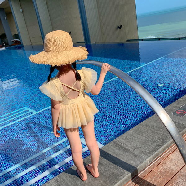 Dječji kupaći kostim s kratkim rukavima i vezicama