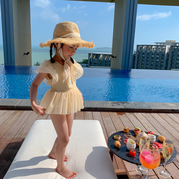 Dječji kupaći kostim s kratkim rukavima i vezicama