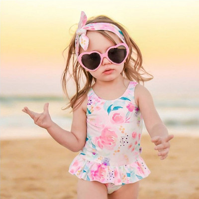 Children`s swimsuit with floral pattern - for girls