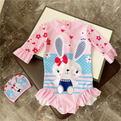 Laste täisujumistrikoo pikkade varrukatega aplikatsiooni ja lukuga