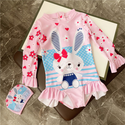 Laste täisujumistrikoo pikkade varrukatega aplikatsiooni ja lukuga