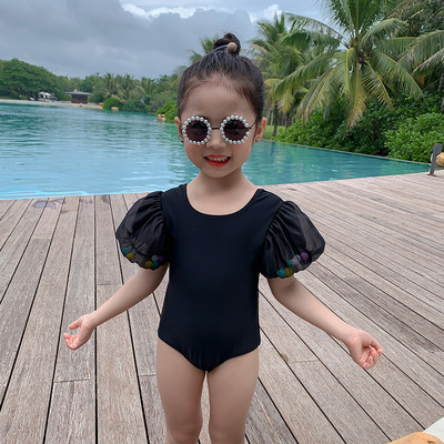 Pilns peldkostīms ar īsām piedurknēm jaku