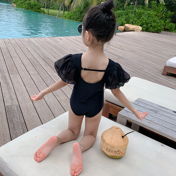 Pilns peldkostīms ar īsām piedurknēm jaku