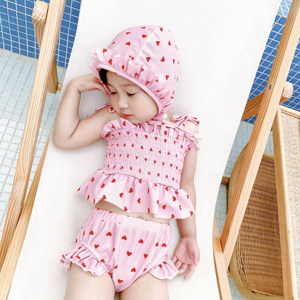 Moodne kaheosaline lokkidega laste ujumistrikoo