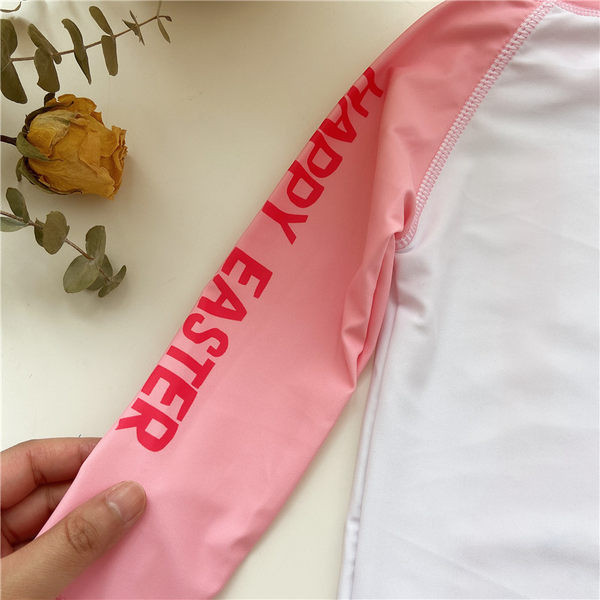 Kaheosaline pikkade varrukate ja aplikatsiooniga laste ujumistrikoo