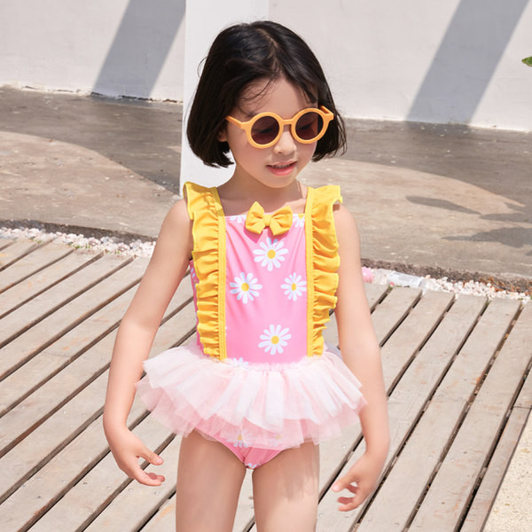 Laste lokkide ja tülliga ujumistrikoo