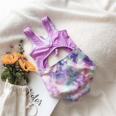 Kahes värvitoonis laiade rihmadega laste ujumistrikoo