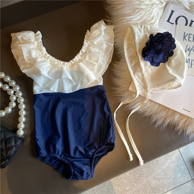 Täielik lokkidega ujumistrikoo tüdrukutele