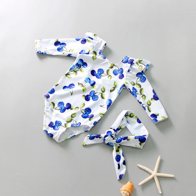 Lillemustri ja pikkade varrukatega laste täisujumistrikoo