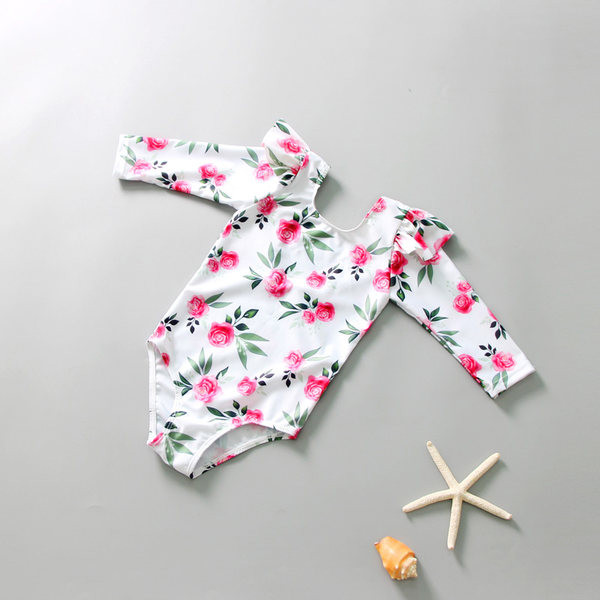 Lillemustri ja pikkade varrukatega laste täisujumistrikoo