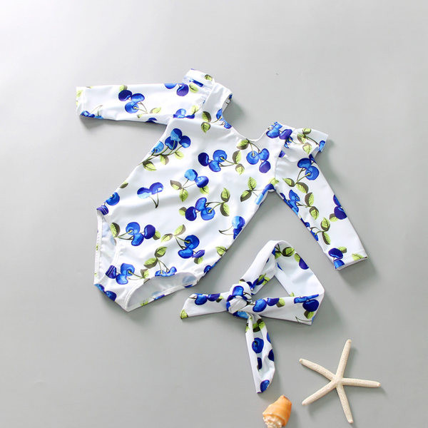 Lillemustri ja pikkade varrukatega laste täisujumistrikoo