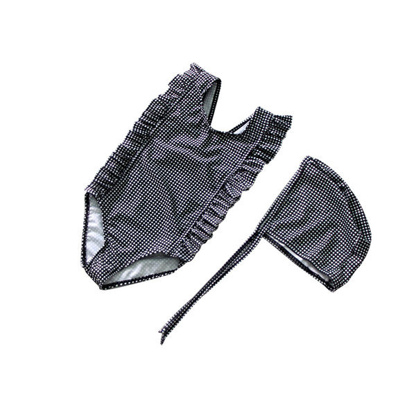 Dječji kupaći kostim na crne točkice