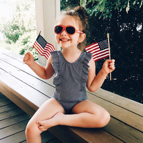 Dječji kupaći kostim na crne točkice