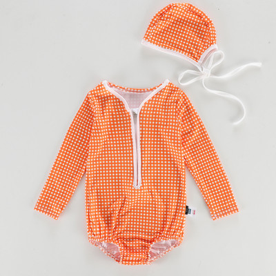 Ruuduline lukuga ja pikkade varrukatega ujumistrikoo