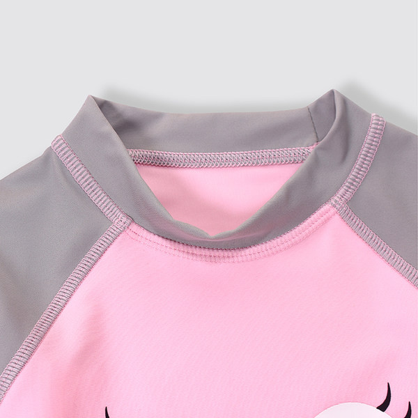 Aplikatsiooni ja pikkade varrukatega laste ujumistrikoo