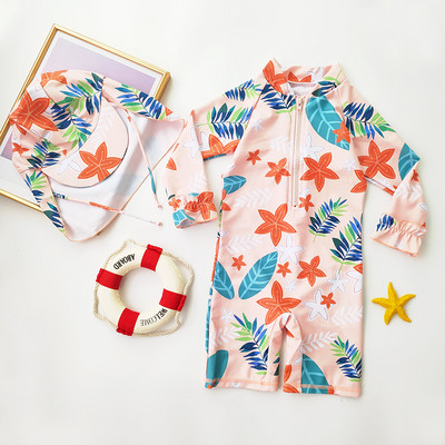 Uus mudel päikesekaitsega ujumistrikoo lukuga ja pikkade varrukatega