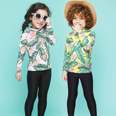 Laste lillemustriga päikesekaitsega ujumistrikoo