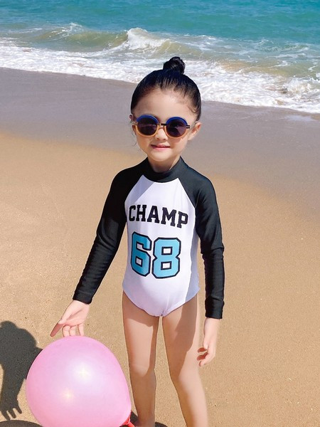 Laste täisujumistrikoo pikkade varrukatega ja trükiga