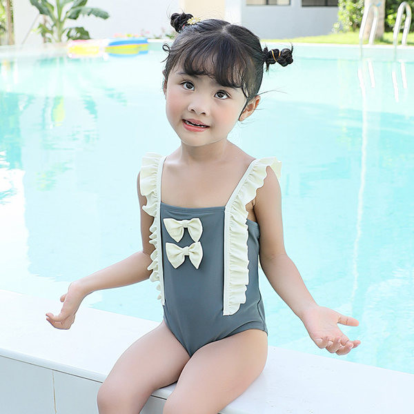 Παιδικό ολόσωμο μαγιό με κορδέλα και τιράντες