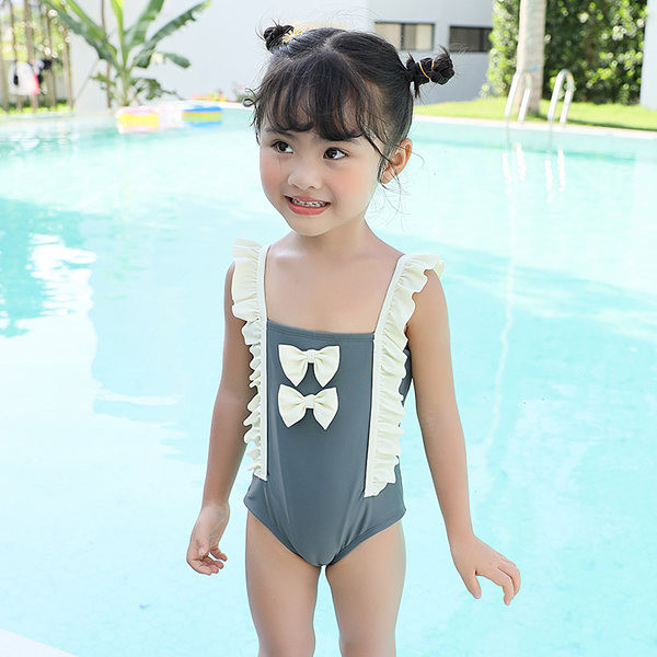 Παιδικό ολόσωμο μαγιό με κορδέλα και τιράντες